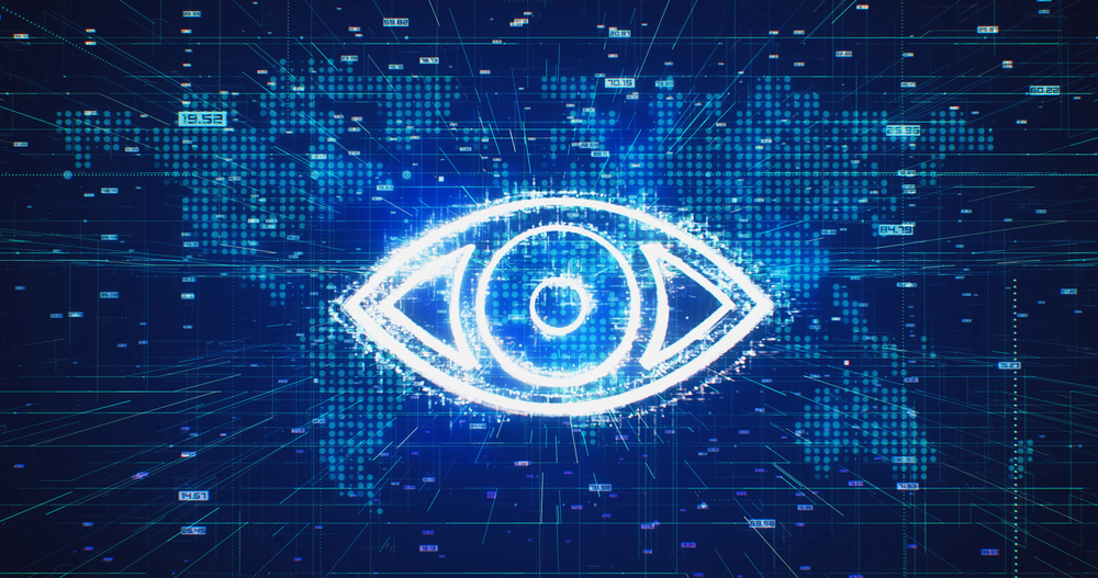 Niebiesko-czarne 'oko' wykonane z kodu komputerowego, symbolizujące Wielkiego Brata, czyli naruszenie prywatności.